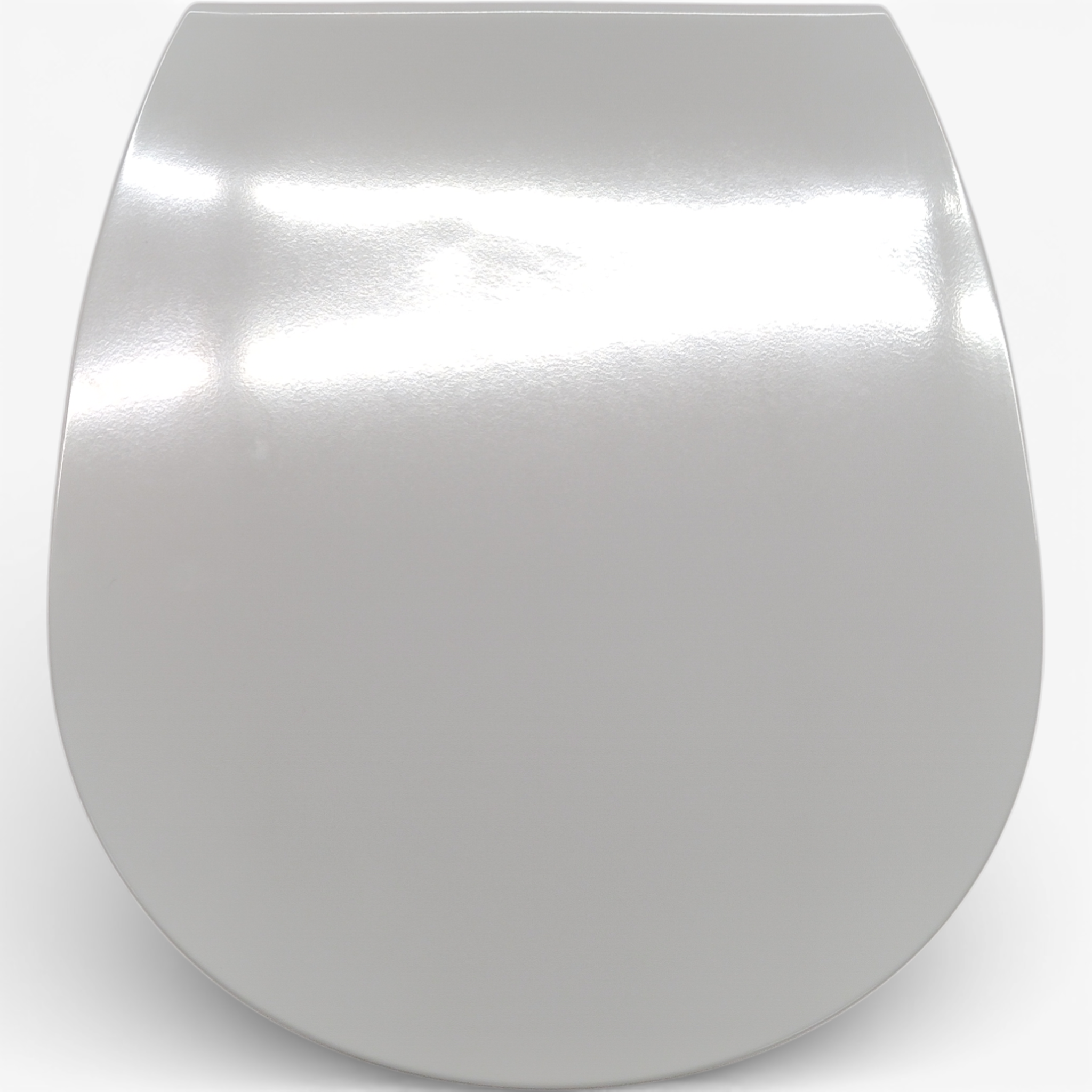 Eine Nahaufnahme des ultraflachen WC-Sitzes mit Absenkautomatik von Ideal Standard Connect, in weiß mit reflektierendem Deckel, fotografiert vor einem schlichten Hintergrund.